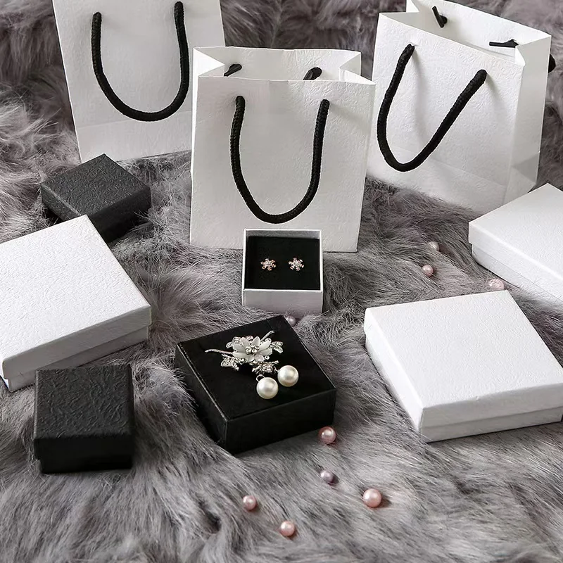 White jewelry gift boxes and presentation bags